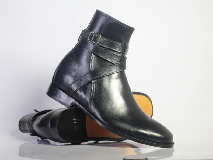 stylish black leather boots featuring decorative buckles on the side