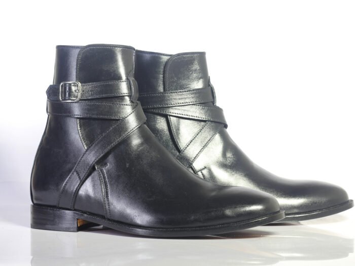 stylish black leather boots featuring decorative buckles on the side