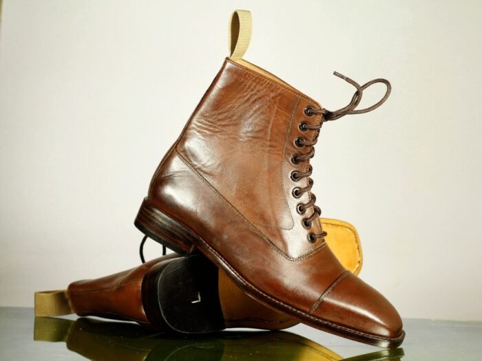 - Rich brown leather - Classic cap toe design - Lace-up closure for secure fit - Handcrafted for exceptional quality