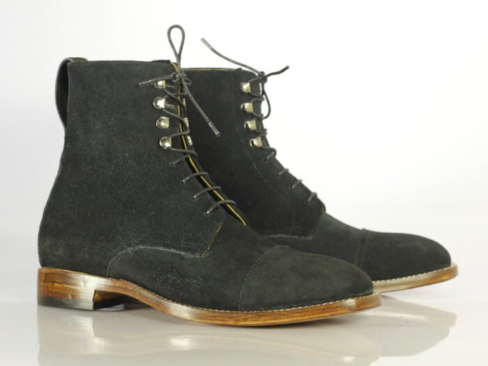 "Black Suede Ankle Boots: Handcrafted Men's Designer Footwear Elevate your style with these luxurious, handmade boots featuring: - Black suede leather - Classic cap toe design - Lace-up closure - Expertly handcrafted for exceptional quality
