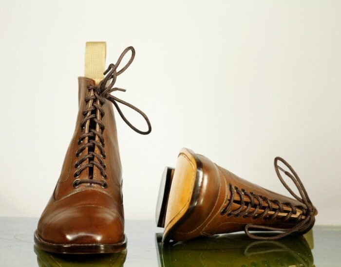 - Rich brown leather - Classic cap toe design - Lace-up closure for secure fit - Handcrafted for exceptional quality